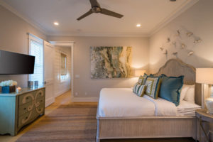 Coastal Bedroom with white and teal accents