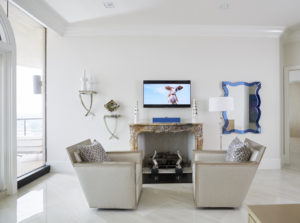 Contemporary Home Office with Antique Stone Fireplace Mantle